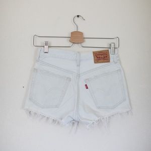 Levi light wash distressed denim shorts.